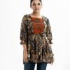 Printed short tunic in blended cotton fabric. square neck, puff-sleeved and karchupi at the front.