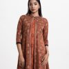 Sleeveless kameez in crepe fabric with a mandarin collar and detail karchupi work shrug in stretched fairy fabric.
