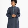 Kid boys panjabi in jacquard fabric. Mandarin collar and inseam pockets. karchupi and embroidery at the front.