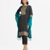 Women's ethnic printed Salwar Kameez in crepe fabric. Round neck, three-quarter sleeves and karchupi at the front of kameez. Half-silk dupatta with pant pajamas.
