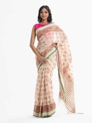 Women's all over printed saree in cotton fabric. Embellished with embroidery and fringe trim at the achal.