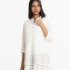 Women's A-line tunic in chicken cotton fabric with inner viscose fabric. Mandarin collar, three-quarter sleeves.