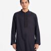 Men's slim fitted panjabi in jacquard fabric.Mandarin collar and inseam pockets. Karchupi at the collar and placket