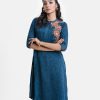 Women's A-line floral printed tunic in crepe fabric. Stand collar, three-quarter sleeves. Embroidery and line stitching at front.
