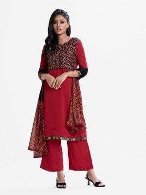 Women's straight salwar kameez in textured georgette fabric. Cutwork with karchupi at front and three-quarter sleeves kameez. Chiffon dupatta with palazzo pants.