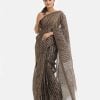 Women's traditional saree in cotton fabric. Embellished with weaving details and fringe trim at the achal.
