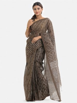 Women's traditional saree in cotton fabric. Embellished with weaving details and fringe trim at the achal.