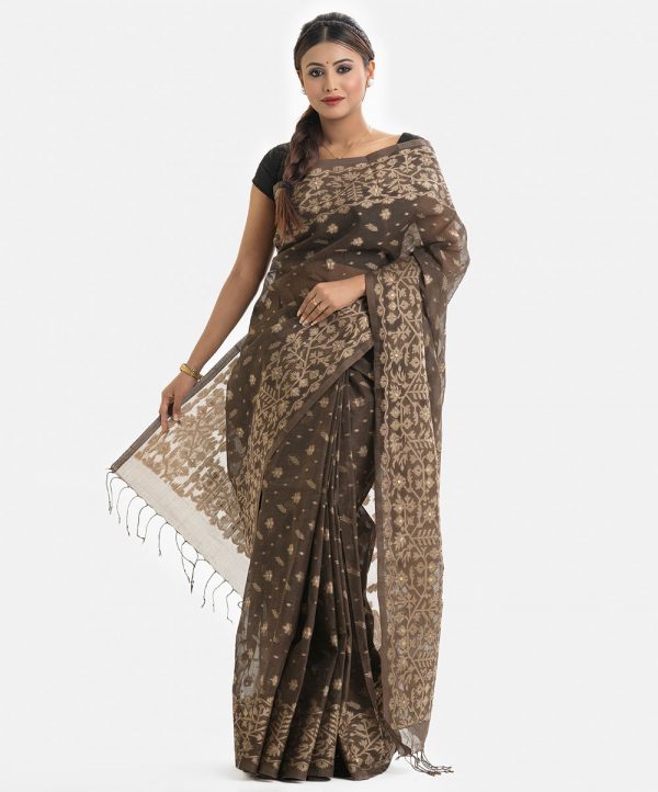 Women's traditional saree in cotton fabric. Embellished with weaving details and fringe trim at the achal.