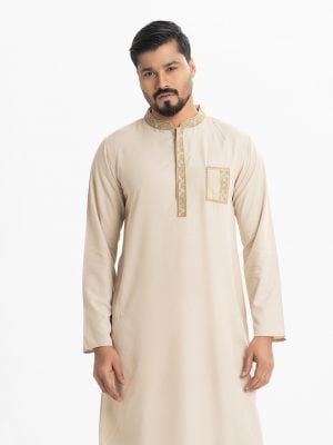 Mens printed in cotton fabric. Mandarin collar, inseam pockets. Embroidery at collar, placket and pocket.