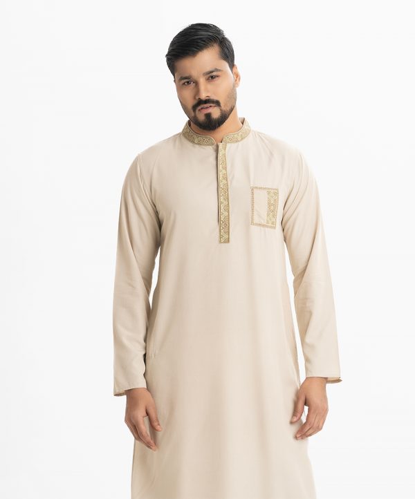 Mens printed in cotton fabric. Mandarin collar, inseam pockets. Embroidery at collar, placket and pocket.