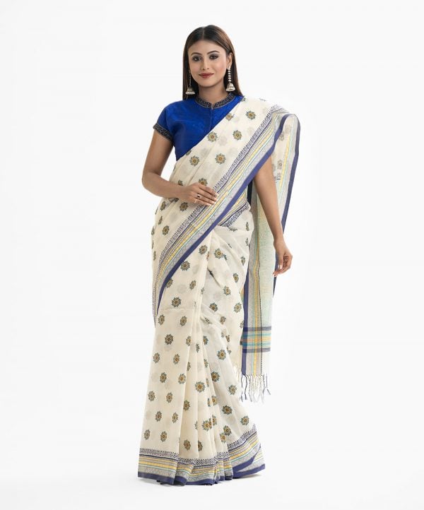 Women's all over printed saree in cotton fabric. Fringe trim at the achal.
