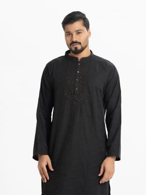 Men's premium panjabi in jacquard fabric. Mandarin collar, inseam pockets, karchupi and button fastening at the front.