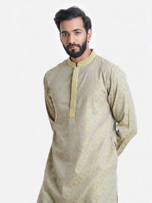 Men's semi fitted panjabi in jacquard cotton fabric. Embroidery at mandarin collar and placket. Inseam pockets.