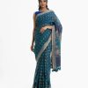 Women's all over printed saree in cotton fabric. Embellished with embroidery and tassel at the achal.