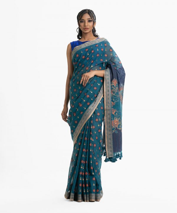 Women's all over printed saree in cotton fabric. Embellished with embroidery and tassel at the achal.