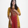 Floral printed three-quarter sleeved shrug with tunic in crepe fabric. karchupi and patch at the front and hemline.