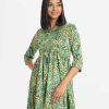 Printed tent style tunic in georgette fabric. Stand collar, three-quarter sleeved and attached patch at the front.