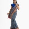 Women's all over printed saree in cotton fabric. Embellished with embroidery and tassel at the achal.