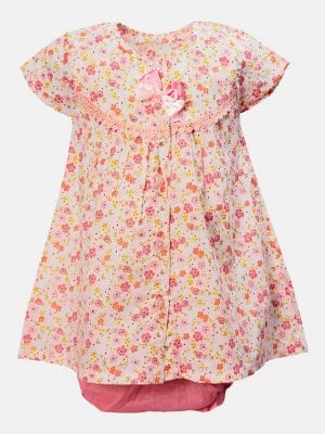 Short sleeve tent-style newborn baby girls frock in cotton fabric. All-over floral printed with lace work at the front and button fastening. Completed with baby pants.