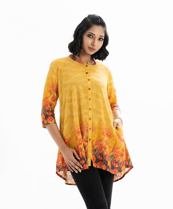 Floral printed ladie's shirt in georgette fabric. Stand collar, three-quarter sleeved. button fastening at the front.