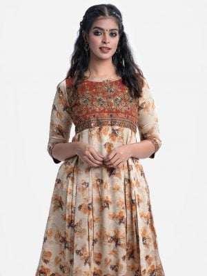 Printed A-line tunic in crepe fabric. Round Neck, three-quarter sleeved with adjustable buttons at cuffs. Karchupi at the front and attach patch at the hemline.