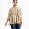 Floral printed woven tops in blended cotton fabric. Stand collar with v-cut, bishop sleeved nad smokey at the front.