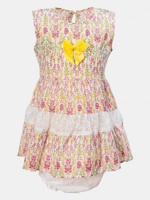 Sleeveless tent-style newborn baby girls frock in cotton fabric. All-over floral printed with lace work at hemline and attached ribbon bow. Completed with baby pants.