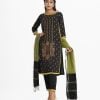 Printed straight salwar kameez in crepe fabric. Boat neck, long sleeves and karchupi at the front. Complemented with crepe culotte pant and half silk dupatta.