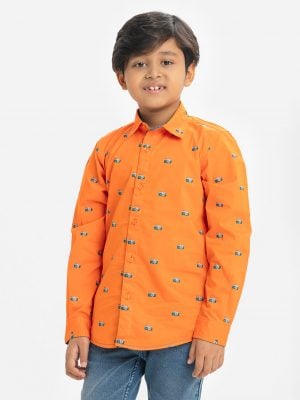 Kid boys printed long-sleeved shirt in cotton fabric. Classic collar and button fastening at the front.
