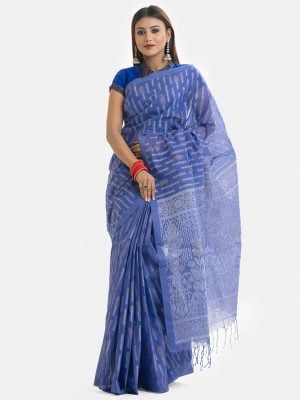 Women's traditional saree in cotton fabric. Embellished with weaving details and fringe trim at the achal.