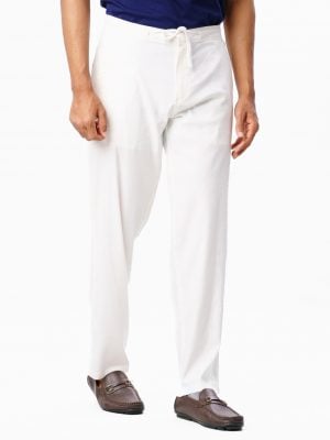 Men's pant pajama in blended cotton fabric. Two zip-fly pockets at sides and back. Adjustable drawsting at waist.