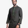 Men's fitted panjabi in jacquard cotton fabric. Embroidery at front and hidden button placket.