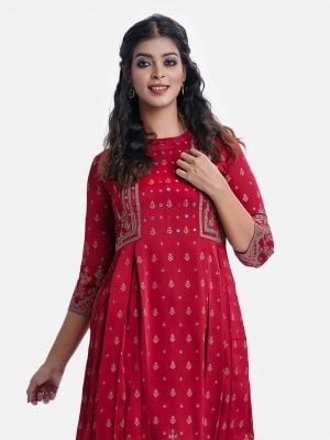 Women's ethnic printed frock style long tunic in crepe fabric. Mock neck and three-quarter sleeves. Box pleats at the side of the waistline. Karchupi at the front and sleeve.