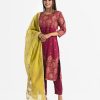 Women's all-over printed straight salwar kameez in crepe fabric. Boat neck, three-quarter sleeves and karchupi at the front of the kameez. With a Half-silk dupatta and pant style pajamas.