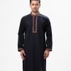 Men's panjabi in jacquard fabric. Embroidery at mandarin collar and placket. Inseam pockets.