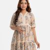 Women's flared style maxi in printed blended cotton fabric. V-neckline, bell sleeves. Lacework at the front and sleeves.
