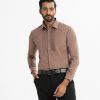 Men's long-sleeved casual shirt in printed cotton blended fabric. Classic collar, button fastening at the front and adjustable metal buttons at the cuffs.