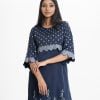 Women's straight kameez in crepe fabric. Round neck , scallops at front and three-quarter sleeves hemline. Karchupi and print at the front.