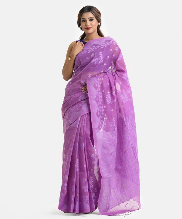 Women's traditional saree in cotton fabric. Embellished with weaving details and fringe trim at the achal.