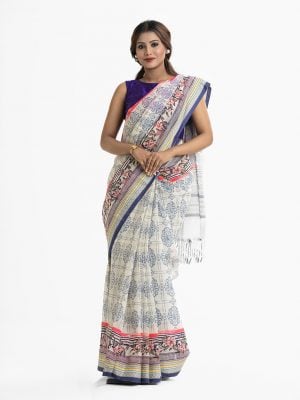 Women's all over printed saree in cotton fabric. Fringe trim at the achal.