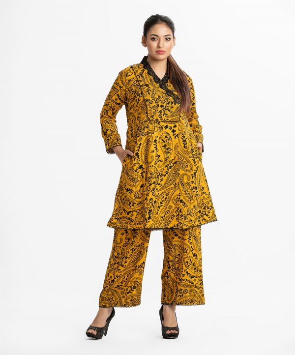 Retro wrap style top bottom set in printed viscose fabric. Lace attach at V-neck with wrap and full sleeves. Palazzo pants as the bottom.