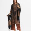 Women's floral printed Salwar Kameez in crepe fabric. Round neck, three-quarter sleeves and karchupi at the front of kameez. Half-silk dupatta with palazzo pants.