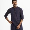 Mens printed semi-fitted panjabi in jacquard fabric. Mandarin collar, inseam pockets. Button fastening at the front.