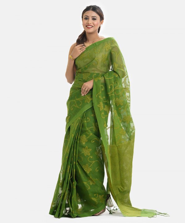 Women's traditional saree in cotton fabric. Embellished with weaving details and fringe trim at the achal.