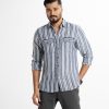 Men's long sleeve stripe casual shirt in printed cotton fabric. Classic collar, button fastening at the front and adjustable metal buttons at cuffs.