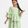 Kid girls floral printed layered tunic in georgette fabric. Round neck, layered three-quarter sleeves and flower attached at the front.