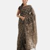 Women's traditional saree in cotton fabric. Embellished with weaving details and fringe trim at the achal.