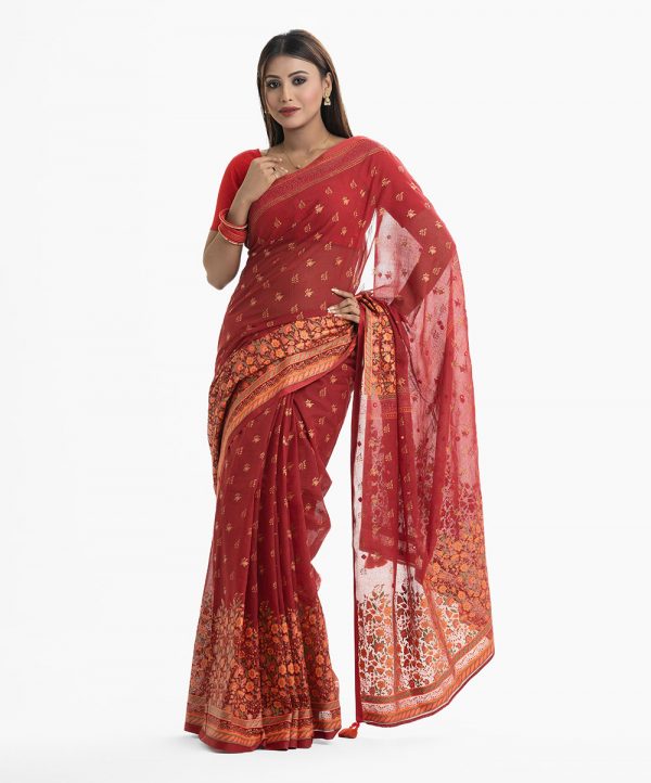Women's all over printed saree in cotton fabric. Embellished with embroidery and fringe trim at the achal.