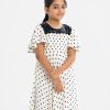 Kid girls A-line polka dot printed frock in georgette fabric. Round neck, butterfly-sleeved. Sequence cut work at the top front.