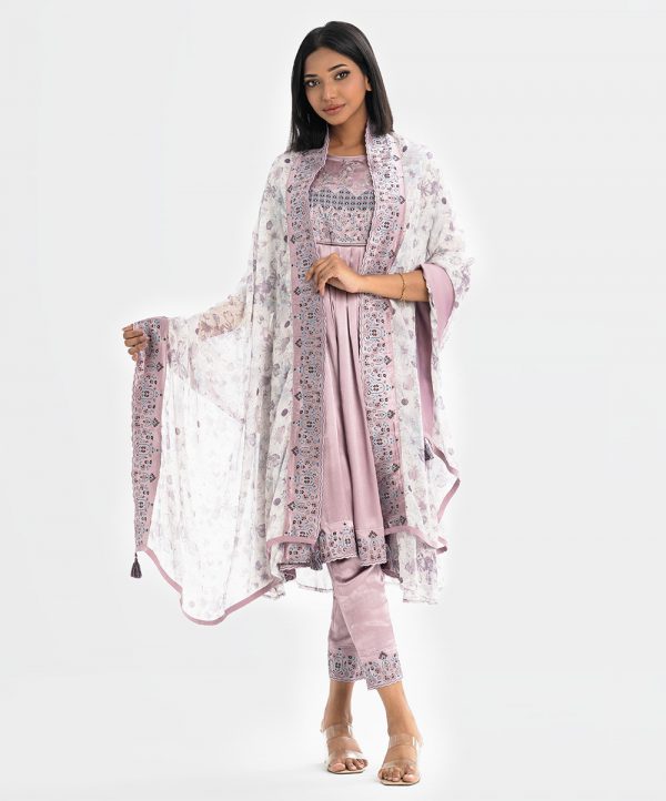 Women's printed layer style Salwar Kameez in georgette fabric with zoom fabric inner. Round neck, three-quarter sleeves and karchupi at the front of kameez. Georgette dupatta with pant-style pajamas.